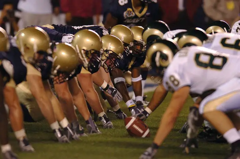 How do American football players make money?