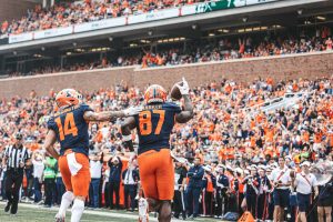 How do businesses make money through sports