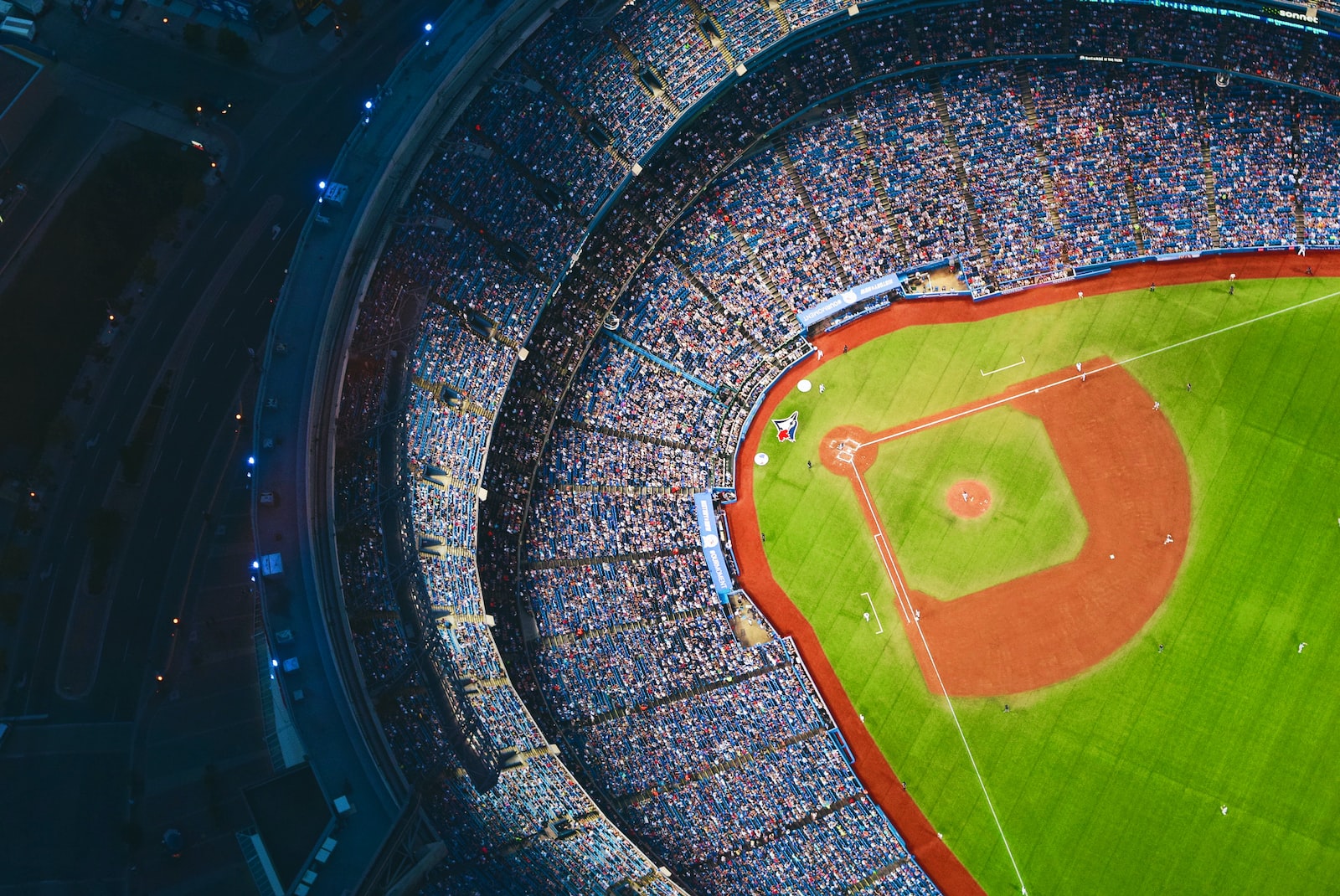 How do Major League Baseball clubs make money? aerial photography of baseball stadium